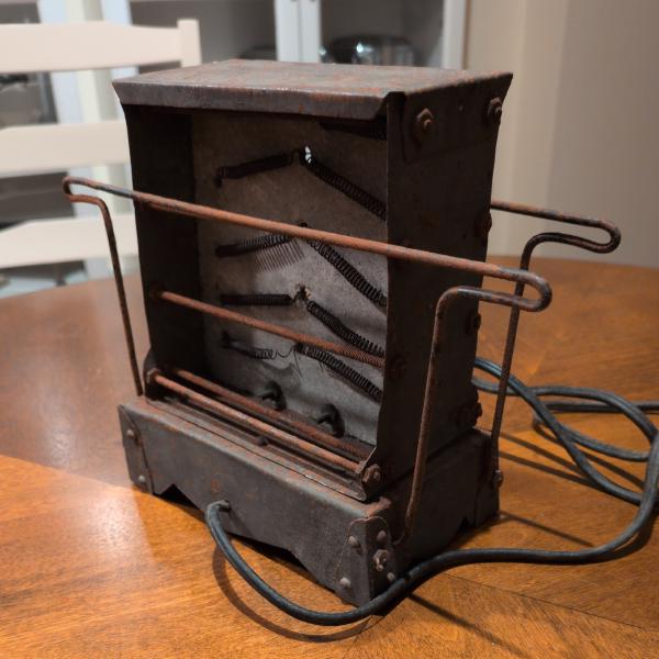 No grommet protects the cord as it enters through the base.